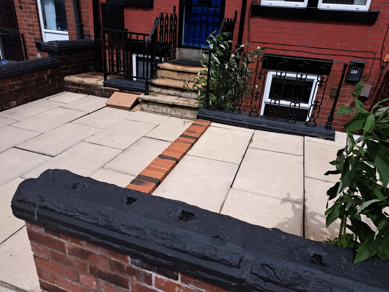 Path after pressure washing in North Leeds